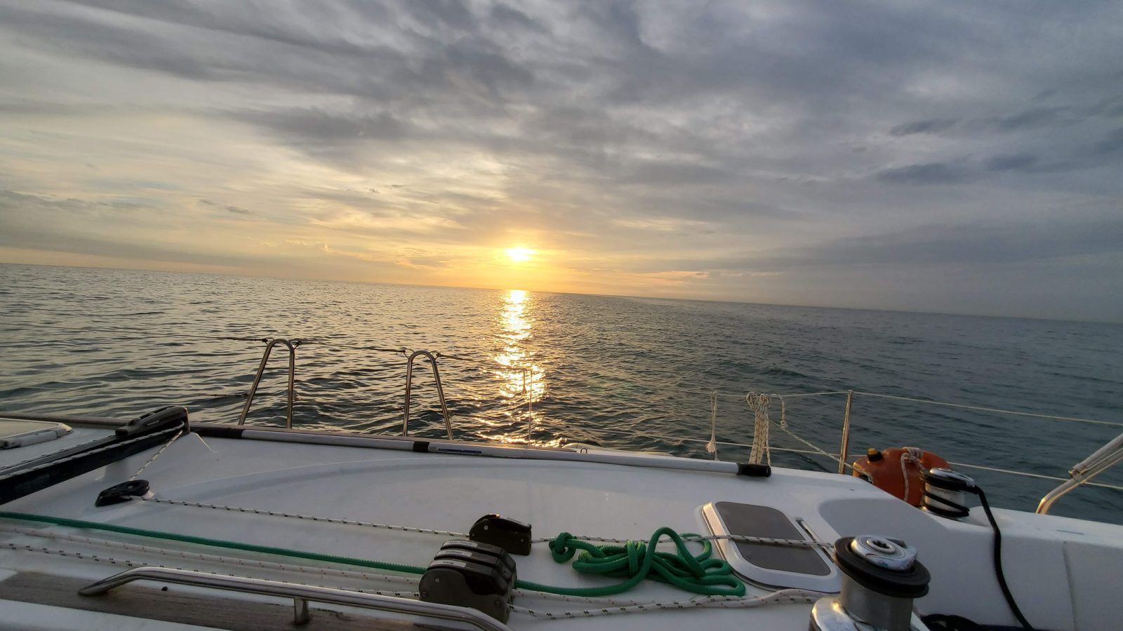 Under sail in turquoise water